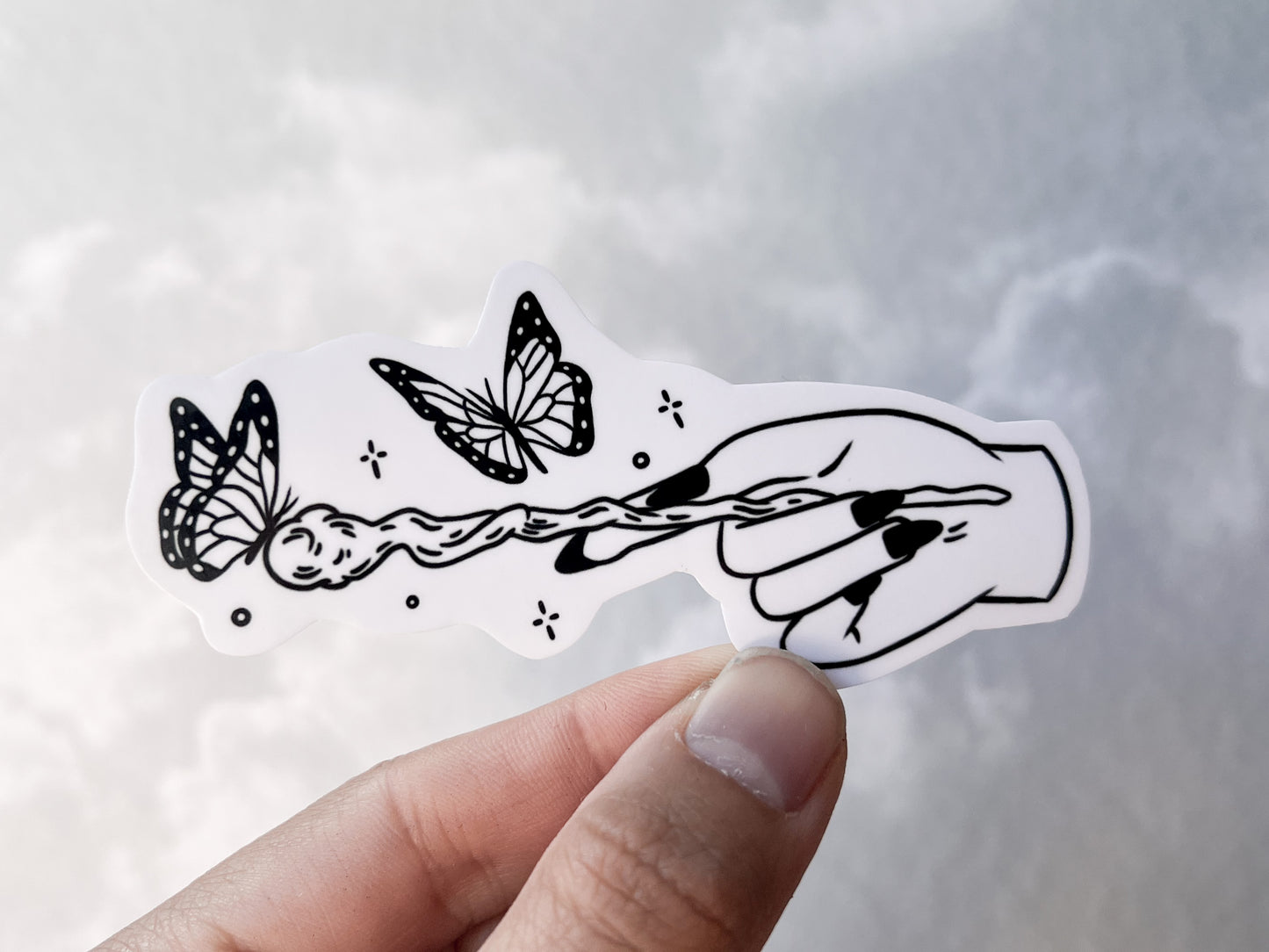 Hand Holding Butterfly Wand Sticker